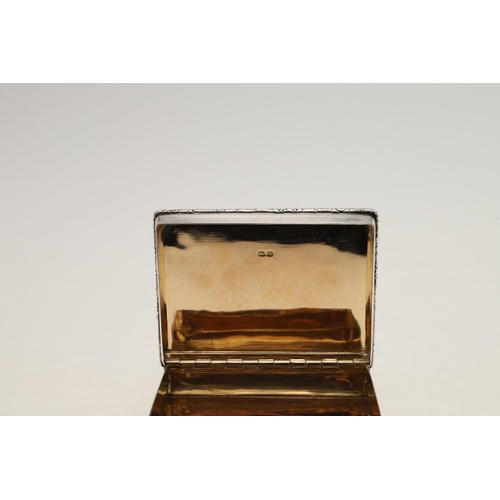 326 - A GEORGE VI RECTANGULAR SNUFF BOX. with floral scroll borders, the hinged cover inset with a panel o... 