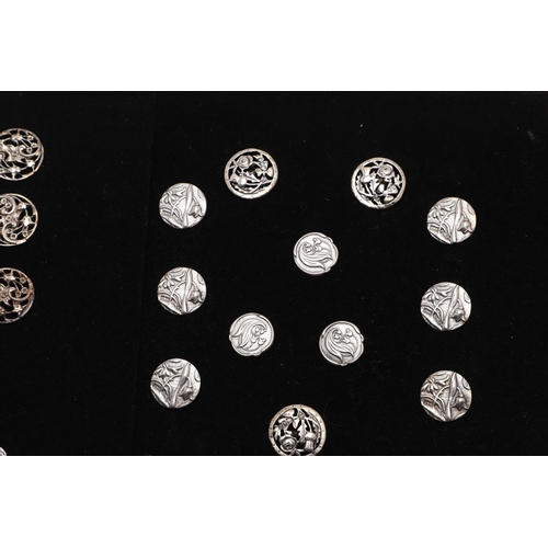 330 - BUTTONS:-. a set of 11 Edwardian buttons, with pierced floral decoration, by Lawrence Emanuel, Birmi... 