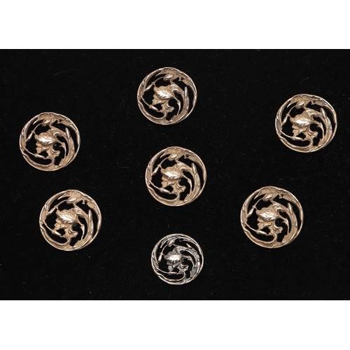 332 - BUTTONS:-. a set of 6 Edwardian buttons and 5 smaller in size, decorated with flowers against a matt... 