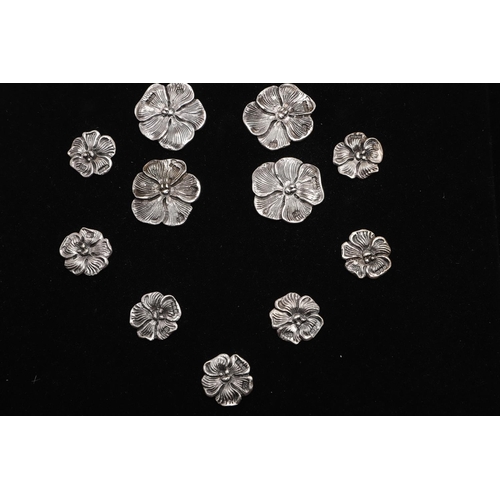 334 - BUTTONS:-. a set of 6 and 12 matching smaller Edwardian buttons, in the form of flowerheads, by Samu... 