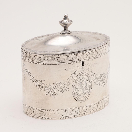 356 - A GEORGE III OVAL TEA CADDY. with engraved decoration, an urn finial and crested on both sides, by J... 