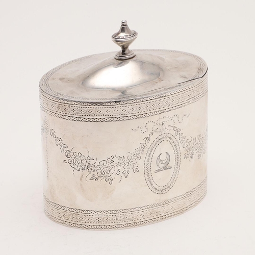 356 - A GEORGE III OVAL TEA CADDY. with engraved decoration, an urn finial and crested on both sides, by J... 