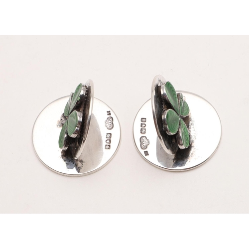 357 - A CASED PAIR OF EDWARDIAN MENU CARD HOLDERS. circular and decorated on the front with green guilloch... 