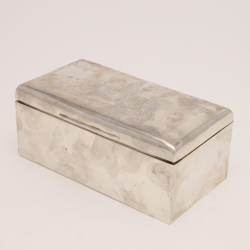 363 - AN EDWARDIAN RECTANGULAR CIGARETTE BOX. engraved with a church or abbey on the cover, by Fenton, Rus... 