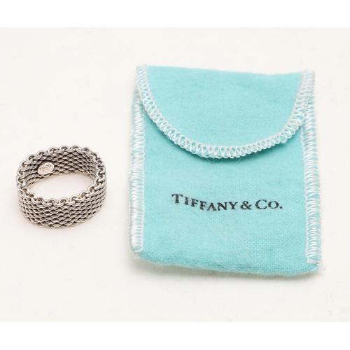 366 - A MIXED LOT:-. two rings, by Tiffany & Co, contained in their original bags, a Georg Jensen ring, al... 