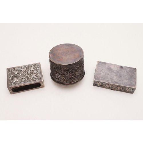 375 - FAR EASTERN SILVER:-. a cylindrical box & cover, a rectangular box and a matchbox holder, decorated ... 