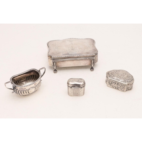 407 - A GEORGE V DRESSING TABLE BOX. shaped rectangular outline, on four short paw legs and with engraved ... 