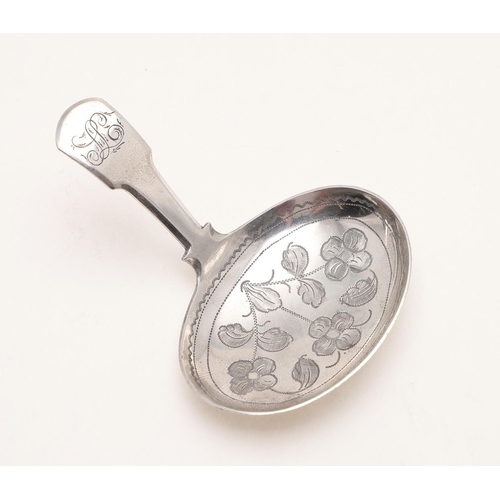 45 - A GEORGE IV CADDY SPOON. with a Fiddle stem and a large oval engraved bowl, initialled, by Francis P... 