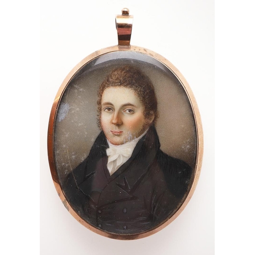 450 - ENGLISH SCHOOL C.1830. Miniature portrait of a young man wearing black jacket, head and shoulders, o... 