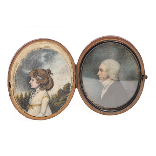 451 - TWO MINIATURE PORTRAITS. early 19th c., a lady wearing white dress with elaborately dressed hair, ha... 