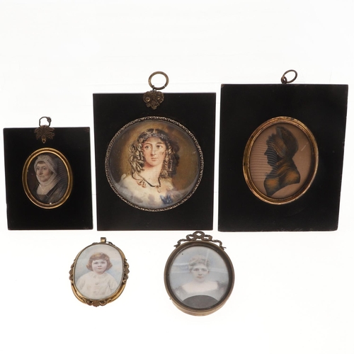 456 - FOUR VARIOUS MINIATURE PORTRAITS. each of a lady, on ivory ,including a Victorian portrait, the sitt... 