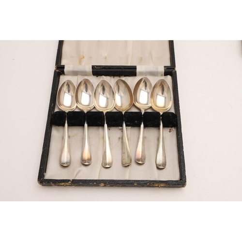 73 - THREE CASED SETS OF TEASPOONS. a set of eight, with enamelled French suits at the terminals, by Turn... 