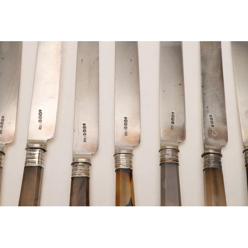 78 - A SUITE OF NINE GEORGE IV AGATE HANDLED DESSERT KNIVES. in three different sizes, contained in a cas... 