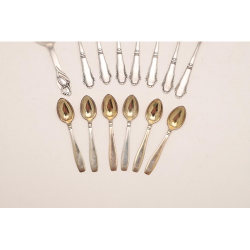 83 - A SET OF ELEVEN 20TH CENTURY DANISH CAKE FORKS. with hammered stems, by Johannes Siggaard, Copenhage... 