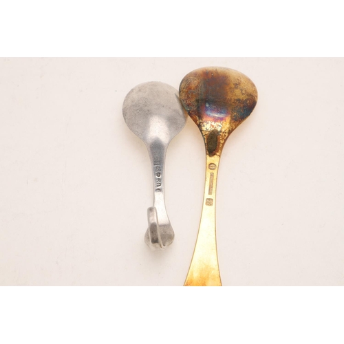 84 - BY GEORG JENSEN:-. a pair of Acorn Pattern teaspoons, a No. 12 Pattern spoon, a silvergilt 