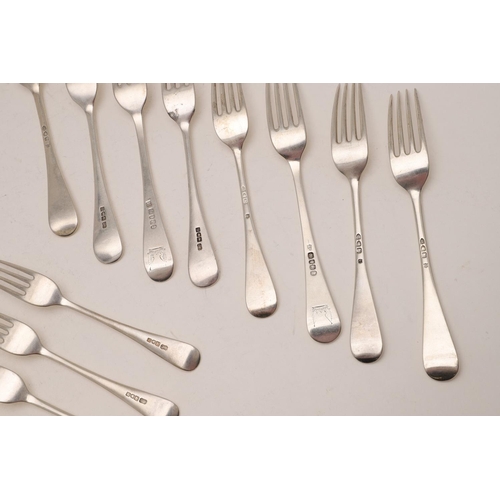 99 - MISCELLANEOUS OLD ENGLISH PATTERN FLATWARE:-. 8 table forks & 14 dessert forks, some pieces crested,... 