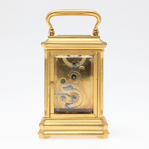 1422 - A LATE 19TH/EARLY 20TH CENTURY FRENCH BRASS MINIATURE CARRIAGE CLOCK. the white enamel dial with Rom... 