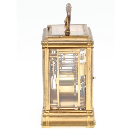 1425 - AN 19TH CENTURY BRASS REPEATING CARRIAGE CLOCK. the eight day two train movement striking the quarte... 