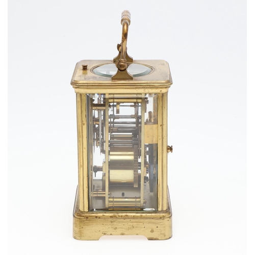 1426 - AN EARLY 20TH CENTURY FRENCH BRASS REPEATING CARRIAGE CLOCK. the enamel dial signed Goldsmiths' Comp... 