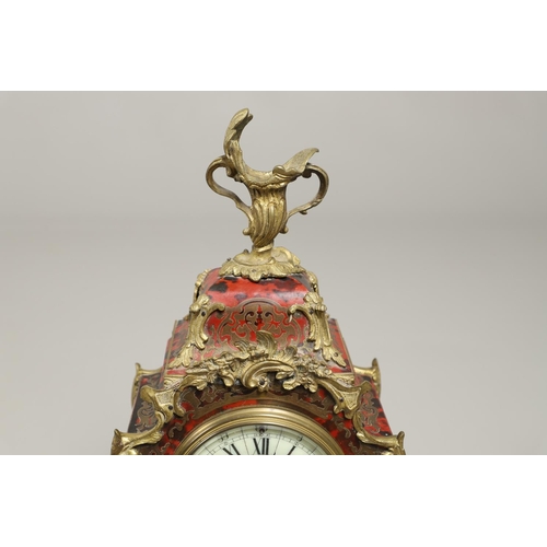 1428 - A 20TH CENTURY FRENCH BOULLE EFFECT CLOCK GARNITURE. the clock with enamel dial above a visible pend... 