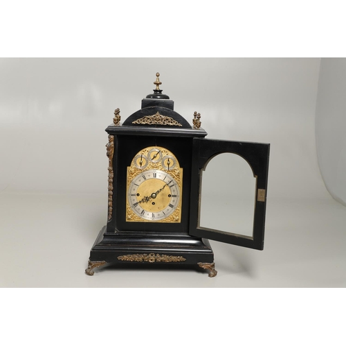 1432 - A GEORGE II STYLE EBONISED AND GILT METAL MOUNTED THREE TRAIN BRACKET CLOCK. the 7