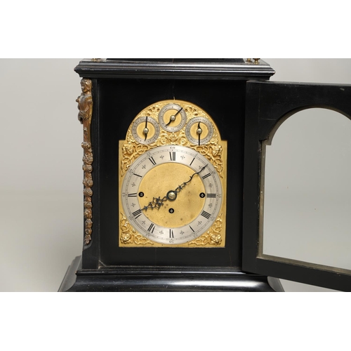 1432 - A GEORGE II STYLE EBONISED AND GILT METAL MOUNTED THREE TRAIN BRACKET CLOCK. the 7