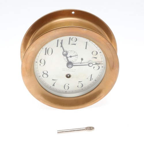 1433 - AN AMERICAN BRASS SHIPS CLOCK BY LOUIS WEULE & CO, SAN FRANCISCO. the steel dial with Arabic numeral... 