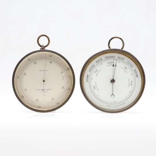 1437 - A NEGRETTI & ZAMBRA BRASS COMPENSATED BAROMETER. 19th century, of drum shaped form, signed and numbe... 