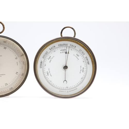 1437 - A NEGRETTI & ZAMBRA BRASS COMPENSATED BAROMETER. 19th century, of drum shaped form, signed and numbe... 