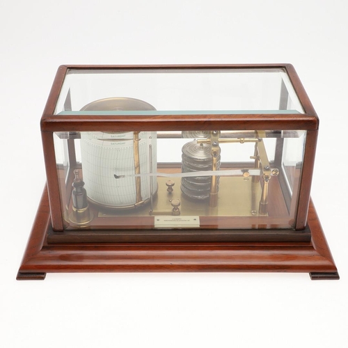 1438 - AN EARLY 20TH CENTURY MAHOGANY BAROGRAPH. brass-mounted with silvered bellows bearing a label for 'J... 