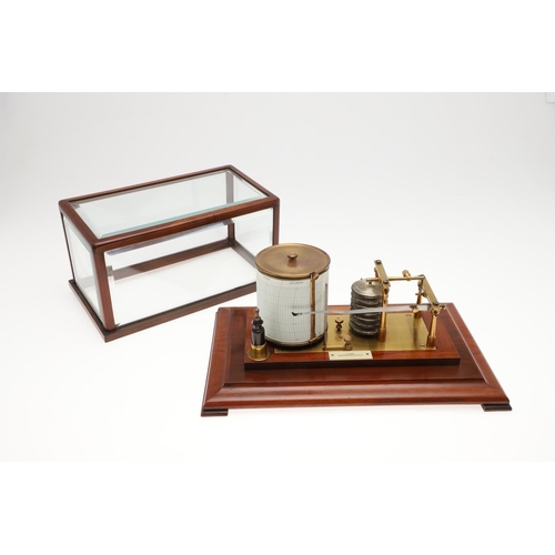 1438 - AN EARLY 20TH CENTURY MAHOGANY BAROGRAPH. brass-mounted with silvered bellows bearing a label for 'J... 