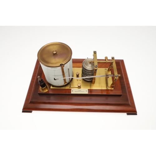 1438 - AN EARLY 20TH CENTURY MAHOGANY BAROGRAPH. brass-mounted with silvered bellows bearing a label for 'J... 