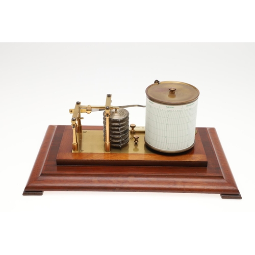 1438 - AN EARLY 20TH CENTURY MAHOGANY BAROGRAPH. brass-mounted with silvered bellows bearing a label for 'J... 