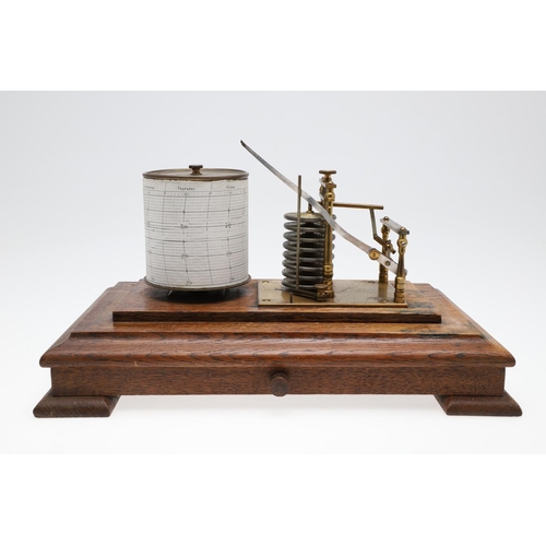 1440 - AN EARLY 20TH CENTURY OAK CASED BAROGRAPH. with silvered bellows and single drawer for papers, heigh... 