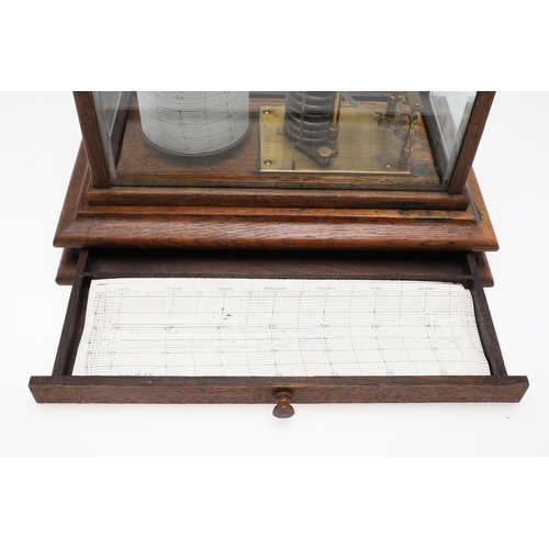 1440 - AN EARLY 20TH CENTURY OAK CASED BAROGRAPH. with silvered bellows and single drawer for papers, heigh... 