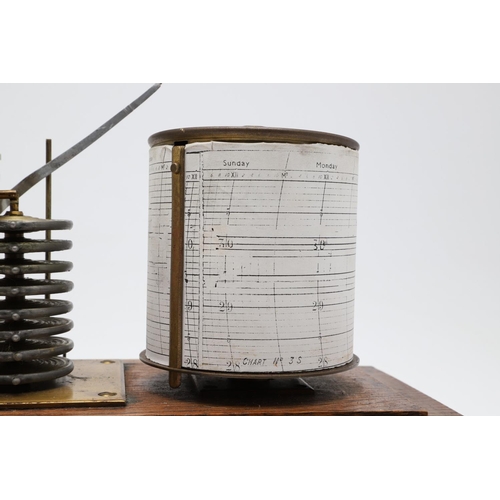 1440 - AN EARLY 20TH CENTURY OAK CASED BAROGRAPH. with silvered bellows and single drawer for papers, heigh... 