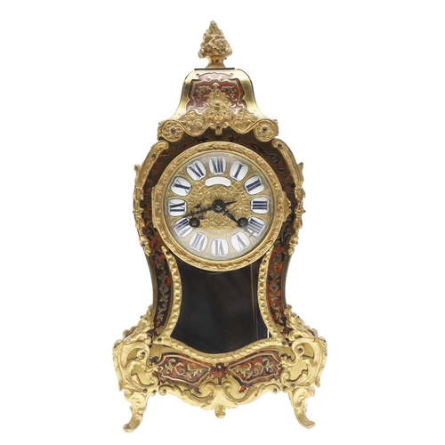 1444 - A 19TH CENTURY FRENCH BOULLE MANTEL CLOCK. the case with tortoiseshell and pierced brass overlay, en... 