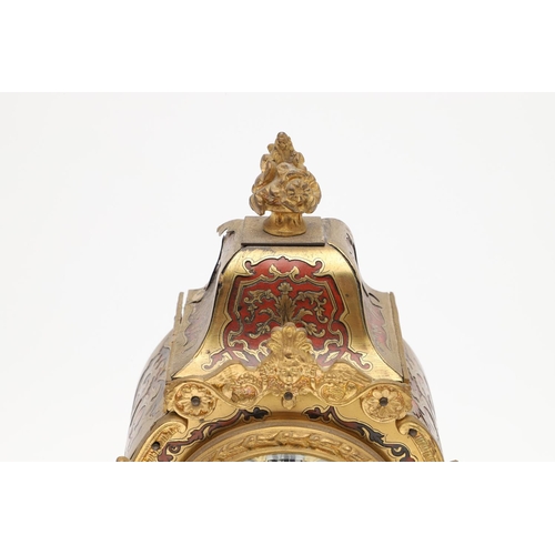 1444 - A 19TH CENTURY FRENCH BOULLE MANTEL CLOCK. the case with tortoiseshell and pierced brass overlay, en... 