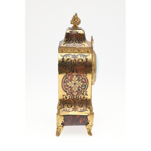 1444 - A 19TH CENTURY FRENCH BOULLE MANTEL CLOCK. the case with tortoiseshell and pierced brass overlay, en... 