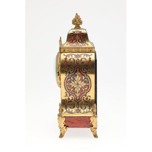 1444 - A 19TH CENTURY FRENCH BOULLE MANTEL CLOCK. the case with tortoiseshell and pierced brass overlay, en... 