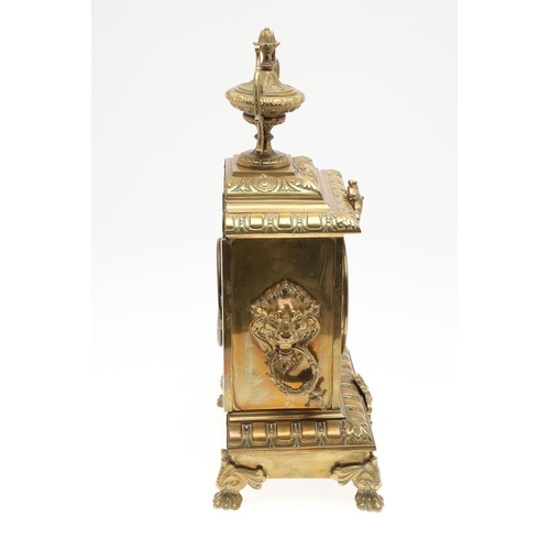 1446 - A FRENCH GILT BRASS MANTEL CLOCK. the 4