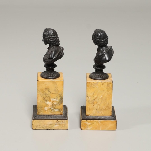 1455 - A PAIR OF 19TH CENTURY GRAND TOUR BRONZE BUSTS. possibly Rousseau and Voltaire, each depicted in per... 