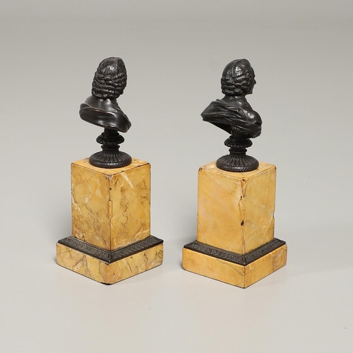 1455 - A PAIR OF 19TH CENTURY GRAND TOUR BRONZE BUSTS. possibly Rousseau and Voltaire, each depicted in per... 