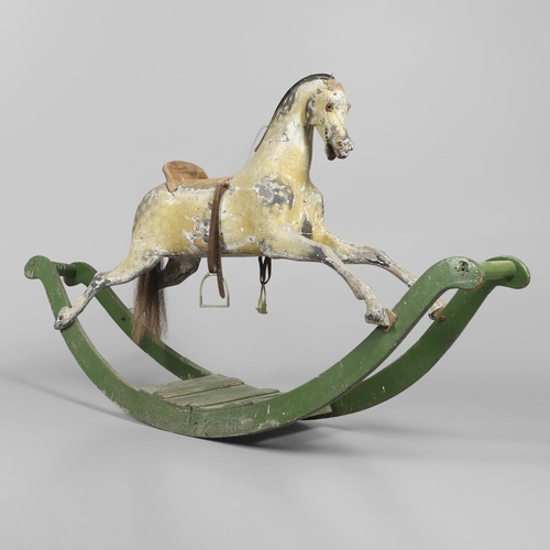 1460 - A 19TH CENTURY PAINTED ROCKING HORSE. the dapple grey painted body with glass eyes, horse hair tail ... 