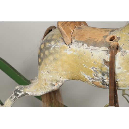 1460 - A 19TH CENTURY PAINTED ROCKING HORSE. the dapple grey painted body with glass eyes, horse hair tail ... 