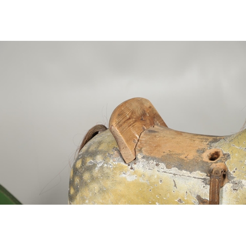 1460 - A 19TH CENTURY PAINTED ROCKING HORSE. the dapple grey painted body with glass eyes, horse hair tail ... 