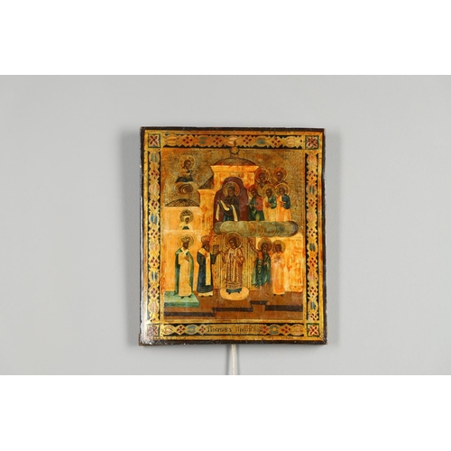 1462 - A PAIR OF RUSSIAN ICONS. 20th century, depicting saintly figures between stylised gilt borders, 31cm... 