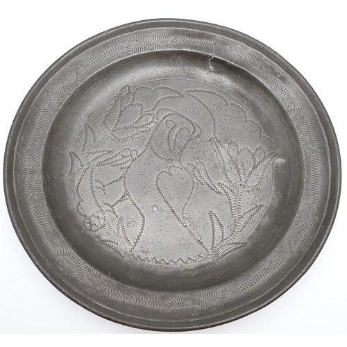 1466 - AN EARLY 18TH CENTURY ENGLISH PEWTER PLATE. with wrigglework decoration of an owl and foliage, stamp... 