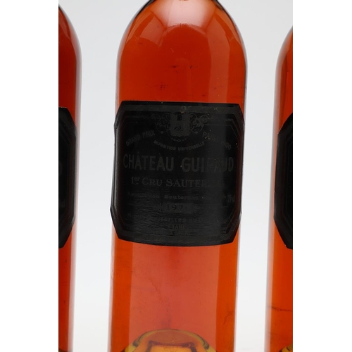 1472 - 1976 CHATEAU GUIRAUD PREMIER CRU SAUTERNES. four loose bottles.  *CR  Appear sealed but three bottle... 