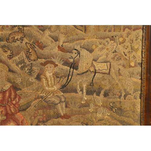 1474 - AN 18TH CENTURY WOOL AND SILK TAPESTRY PANEL. probably English, depicting a hunting scene of  figure... 